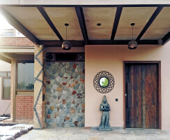 Entrance Foyer - A play of natural materials and textures awakening the senses at the entrance itself